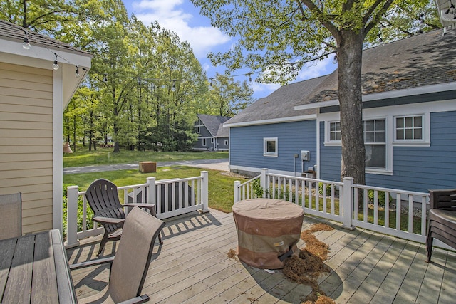 23 Kenneth St, Pentwater, MI 49449 - wooden terrace featuring a yard