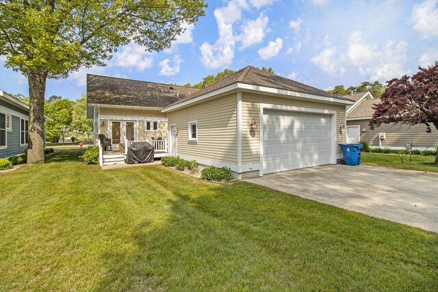 23 Kenneth St, Pentwater, MI 49449 - rear view of property featuring a yard and a deck