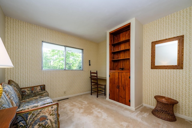 312 S Veronica Ct, Saint Joseph, MI 49085 - sitting room featuring wallpapered walls, carpet flooring, and baseboards