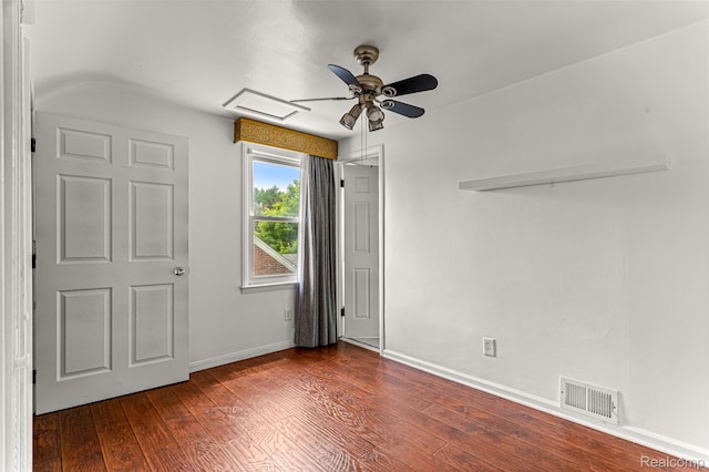 5835 Oakman Blvd, Dearborn, MI 48126 - unfurnished bedroom with dark wood finished floors, baseboards, and ceiling fan