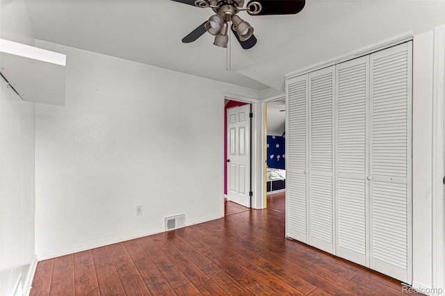 5835 Oakman Blvd, Dearborn, MI 48126 - unfurnished bedroom featuring hardwood / wood-style floors, a closet, baseboards, and a ceiling fan