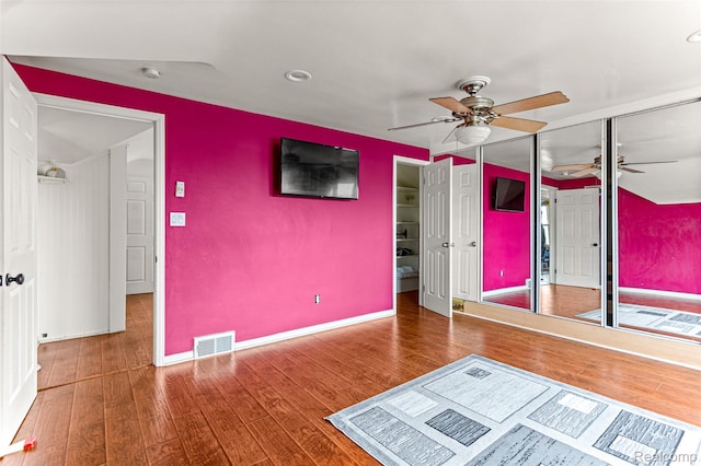 5835 Oakman Blvd, Dearborn, MI 48126 - unfurnished bedroom with wood finished floors, baseboards, a ceiling fan, and recessed lighting