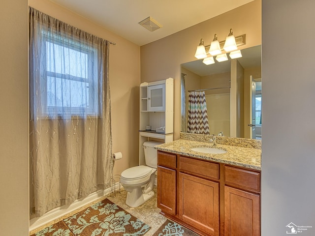 8721 E Park Ridge Cir, Newport, MI 48166 - bathroom featuring healthy amount of natural light, vanity, toilet, and curtained shower