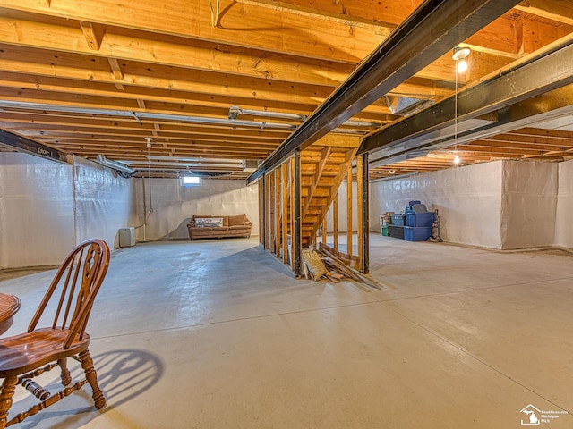 8721 E Park Ridge Cir, Newport, MI 48166 - unfinished basement featuring stairway