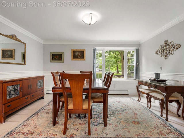 11474 Clairmont Dr, Fenton, MI 48430 - dining room featuring a baseboard radiator, ornamental molding, light tile patterned flooring, and a wainscoted wall