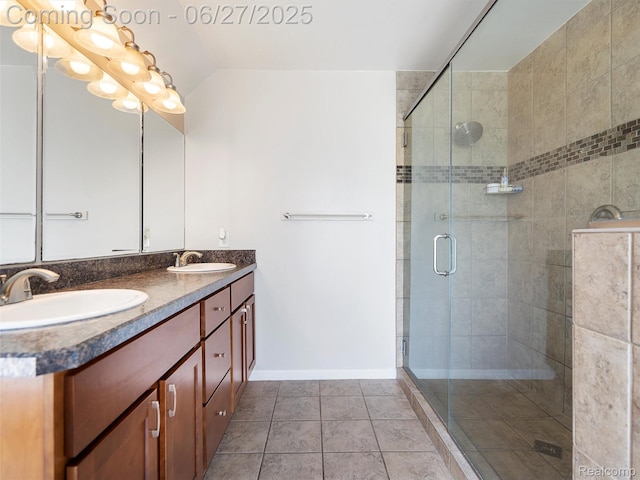 11474 Clairmont Dr, Fenton, MI 48430 - bathroom featuring double vanity, a shower stall, and tile patterned flooring