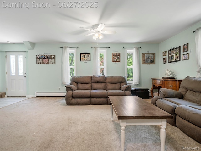 11474 Clairmont Dr, Fenton, MI 48430 - carpeted living area featuring baseboard heating and a ceiling fan
