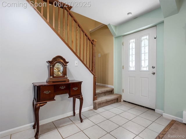 11474 Clairmont Dr, Fenton, MI 48430 - entryway featuring stairs and light tile patterned floors