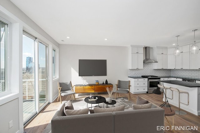 627 Fairview Ave NE Unit 2, Grand Rapids, MI 49503 - living room with dark wood-style floors and recessed lighting