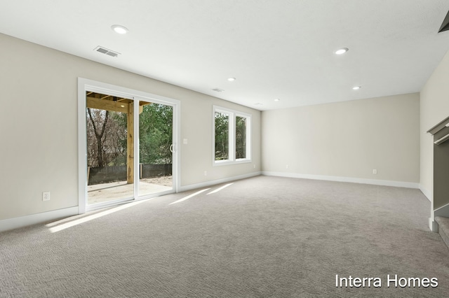 345 Hickory Valley Dr, Kalamazoo, MI 49009 - unfurnished living room with carpet flooring, recessed lighting, and baseboards