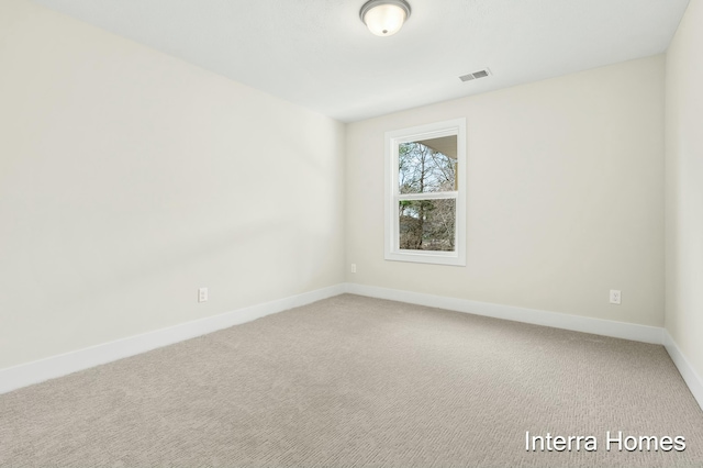 345 Hickory Valley Dr, Kalamazoo, MI 49009 - carpeted empty room featuring baseboards