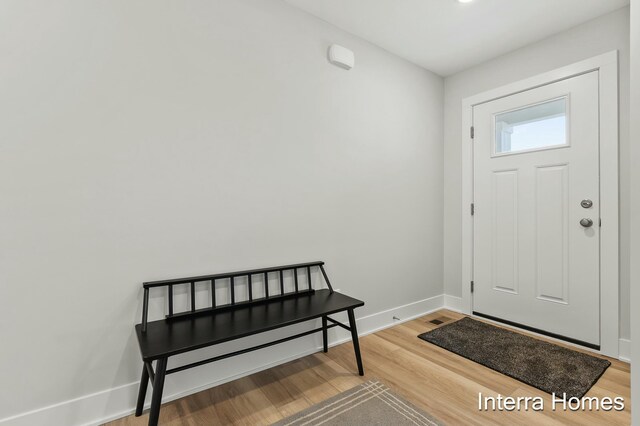345 Hickory Valley Dr, Kalamazoo, MI 49009 - foyer with light wood finished floors and baseboards