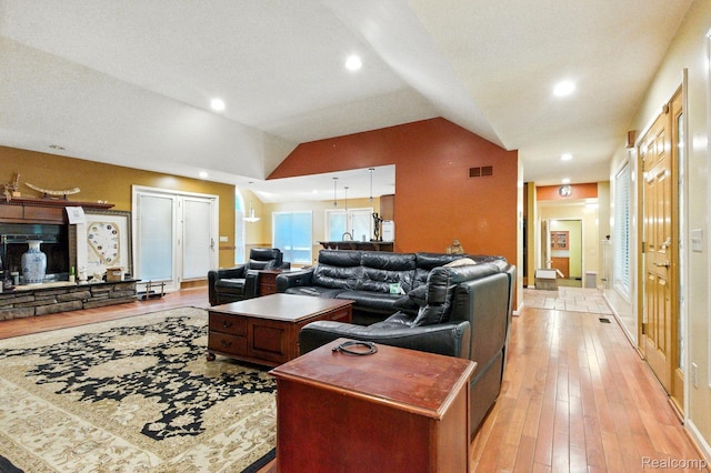 3680 Miller Rd, Ann Arbor, MI 48103 - living room featuring lofted ceiling, light wood-type flooring, and recessed lighting