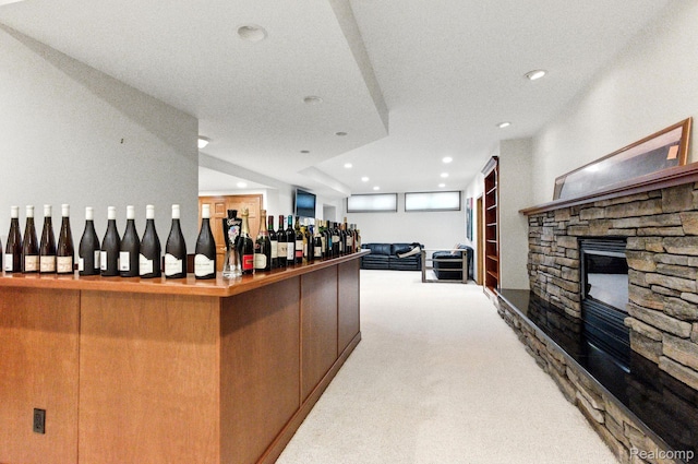 3680 Miller Rd, Ann Arbor, MI 48103 - welcome area with a stone fireplace, recessed lighting, and a dry bar