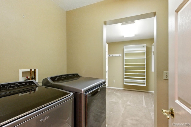3680 Miller Rd, Ann Arbor, MI 48103 - laundry area with washer and dryer and light carpet