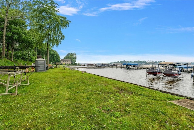 4940 Pottawatamie Path, Watervliet, MI 49098 - dock area with a lawn, a water view, and boat lift