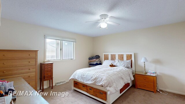 3257 N Christy Way, Saginaw, MI 48603 - carpeted bedroom featuring a ceiling fan and baseboards