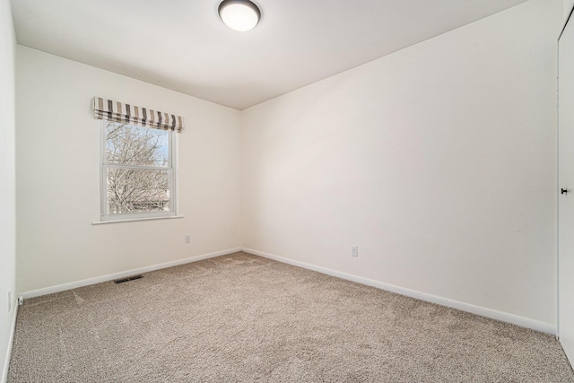 2149 Fair St, Ann Arbor, MI 48103 - spare room featuring carpet flooring and baseboards