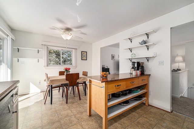 2149 Fair St, Ann Arbor, MI 48103 - dining space with ceiling fan and baseboards