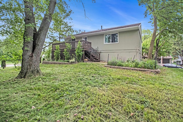2149 Fair St, Ann Arbor, MI 48103 - rear view of property featuring stairway, a deck, and a lawn