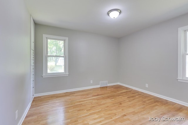 6449 Wendell St SE, Grand Rapids, MI 49546 - empty room with light wood-style flooring and baseboards
