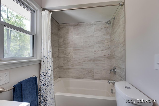 6449 Wendell St SE, Grand Rapids, MI 49546 - bathroom with shower / bath combination with curtain and toilet