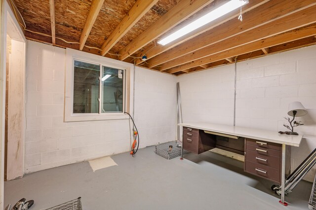 20550 19 Mile Rd, Big Rapids, MI 49307 - unfinished basement with a desk and concrete block wall