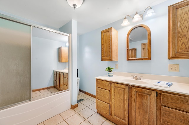20550 19 Mile Rd, Big Rapids, MI 49307 - full bath with tile patterned flooring, vanity, a bath, and toilet