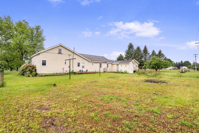 20550 19 Mile Rd, Big Rapids, MI 49307 - back of property featuring a lawn