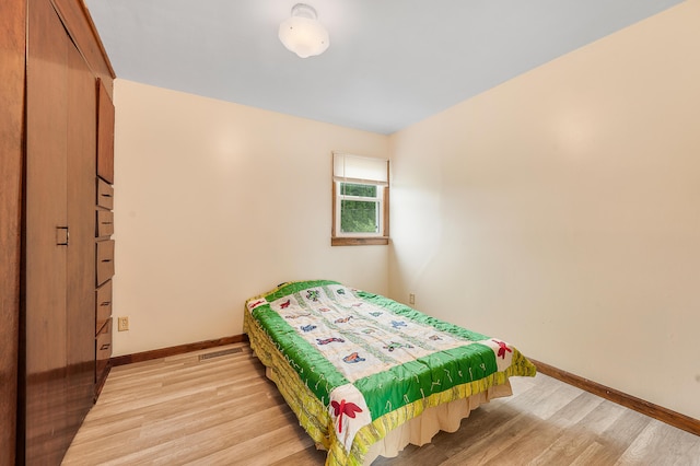 20550 19 Mile Rd, Big Rapids, MI 49307 - bedroom featuring light wood-style flooring and baseboards