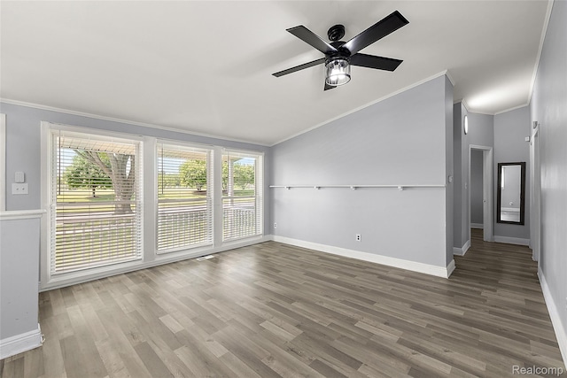 5115 Arden Ave, Warren, MI 48092 - spare room featuring ornamental molding, plenty of natural light, baseboards, and wood finished floors