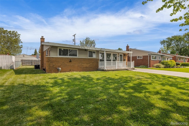 5115 Arden Ave, Warren, MI 48092 - ranch-style house with a chimney and brick siding