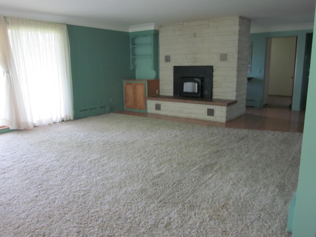 43859 60th Ave, Paw Paw, MI 49079 - unfurnished living room with carpet floors, a baseboard heating unit, and a fireplace