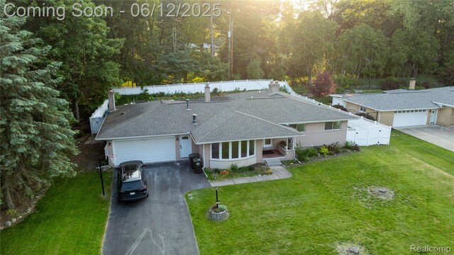 626 Wilwood Rd, Rochester Hills, MI 48309 - aerial view of property and surrounding area with a heavily wooded area