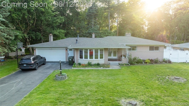 626 Wilwood Rd, Rochester Hills, MI 48309 - single story home with driveway, an attached garage, brick siding, a chimney, and a shingled roof