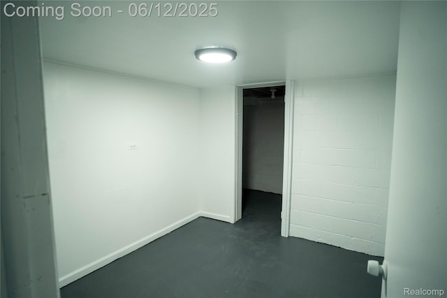 626 Wilwood Rd, Rochester Hills, MI 48309 - unfurnished bedroom with finished concrete floors and concrete block wall