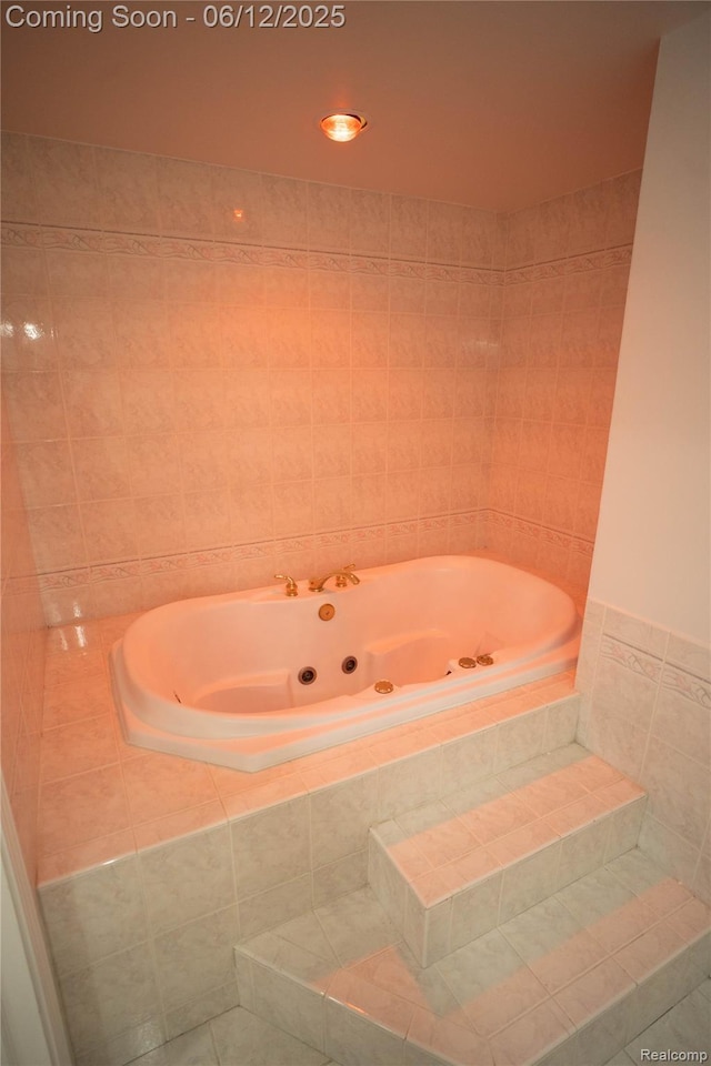 626 Wilwood Rd, Rochester Hills, MI 48309 - full bathroom featuring a tub with jets, tile walls, and tile patterned floors