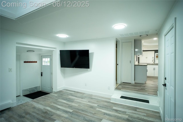 626 Wilwood Rd, Rochester Hills, MI 48309 - foyer entrance with light wood-type flooring and baseboards