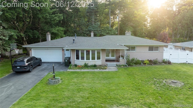 626 Wilwood Rd, Rochester Hills, MI 48309 - ranch-style home featuring driveway, brick siding, a garage, a chimney, and a shingled roof