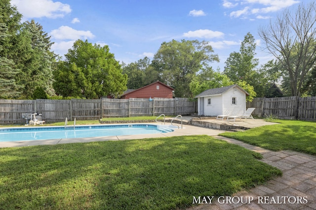 1951 Leonard St NW, Grand Rapids, MI 49504 - view of pool with an outdoor structure and a patio