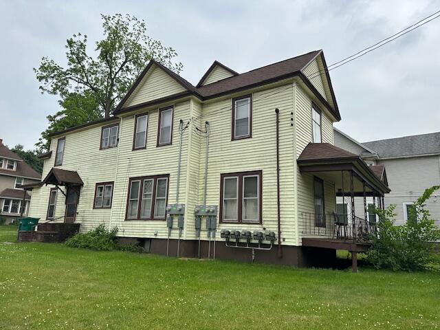 1803 Portage St, Kalamazoo, MI 49001 - back of house featuring a yard and a porch
