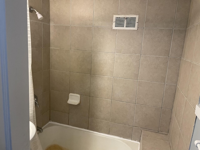 1803 Portage St, Kalamazoo, MI 49001 - bathroom featuring shower / bathtub combination