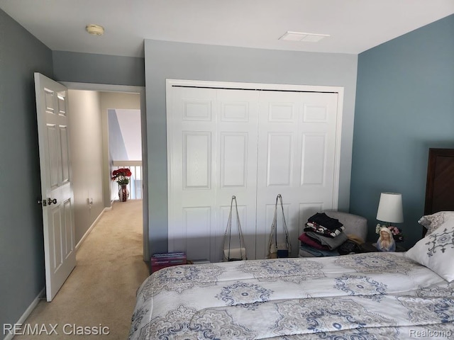 5659 Victory Cir, Sterling Heights, MI 48310 - bedroom featuring light colored carpet, a closet, and baseboards