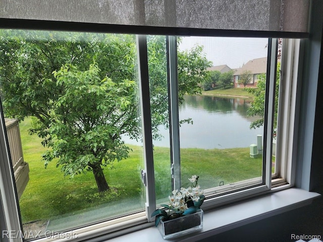 5659 Victory Cir, Sterling Heights, MI 48310 - doorway to outside with a water view and healthy amount of natural light