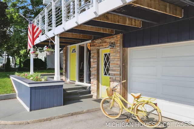 2259 Ottawa Beach Rd, Holland, MI 49424 - property entrance featuring stone siding