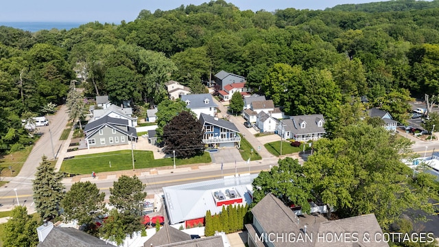 2259 Ottawa Beach Rd, Holland, MI 49424 - aerial perspective of suburban area with a forest