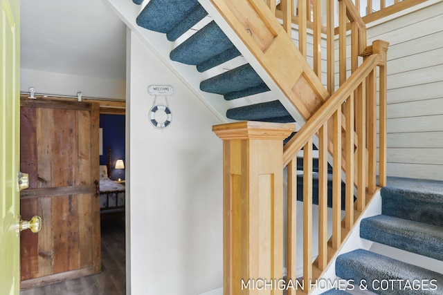 2259 Ottawa Beach Rd, Holland, MI 49424 - stairway with wood finished floors