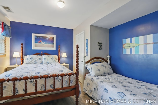 2259 Ottawa Beach Rd, Holland, MI 49424 - bedroom with wood finished floors