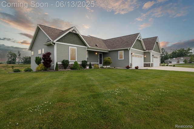 3234 White Heron Ln, Battle Creek, MI 49015 - craftsman inspired home featuring driveway, a yard, and a garage