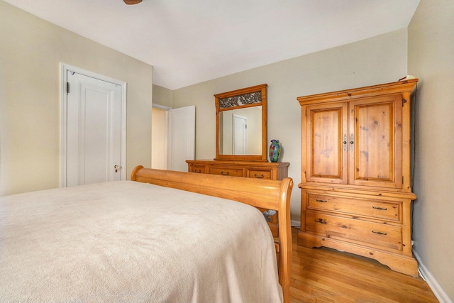 2147 Academy Dr NE, Grand Rapids, MI 49503 - bedroom with light wood-style floors and baseboards